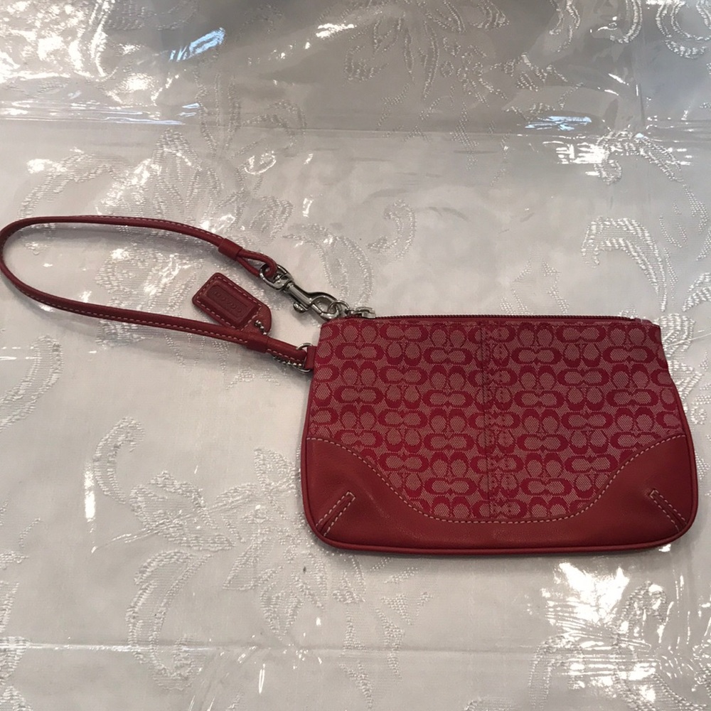 Coach wristlet in red signature style